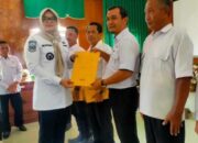 Bupati Tanjabtim Serahkan SPPT dan DHKP PBB Sektor Pedesaan dan Perkotaan