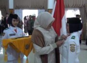 Bupati Dillah Kukuhkan 30 Pasukan Terpilih, Siap Kibarkan Merah Putih di Langit Tanjab Timur
