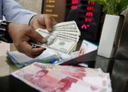 Rupiah Ditutup Melemah ke Rp16.272 per Dolar AS